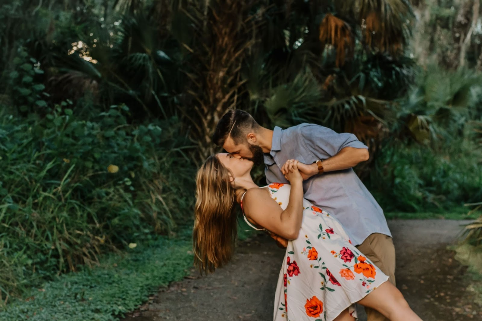 couple kissing and engagement