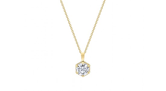 a yellow gold pendant necklace with a diamond center stone by Michael M