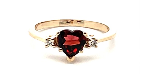 a yellow gold fashion ring featuring a heart shape garnet