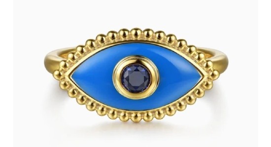 a yellow gold fashion ring featuring a blue sapphire and blue ceramic