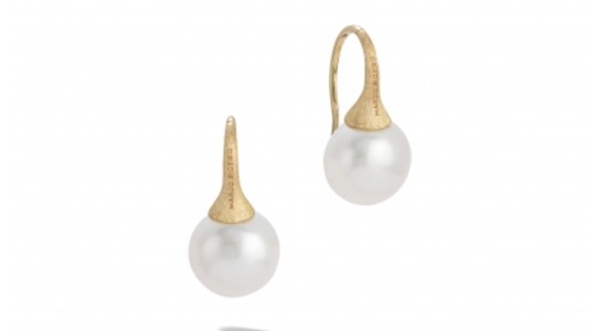 a pair of yellow gold pearl drop earrings by Marco Bicego