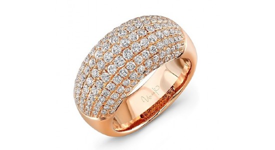 a rose gold dome ring featuring pave set diamond accents