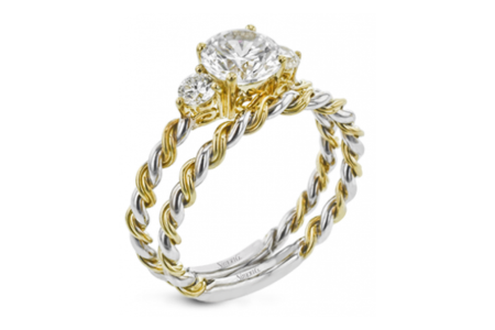 A distinctive twist wedding set from Simon G., available at Lewis Jewelers.