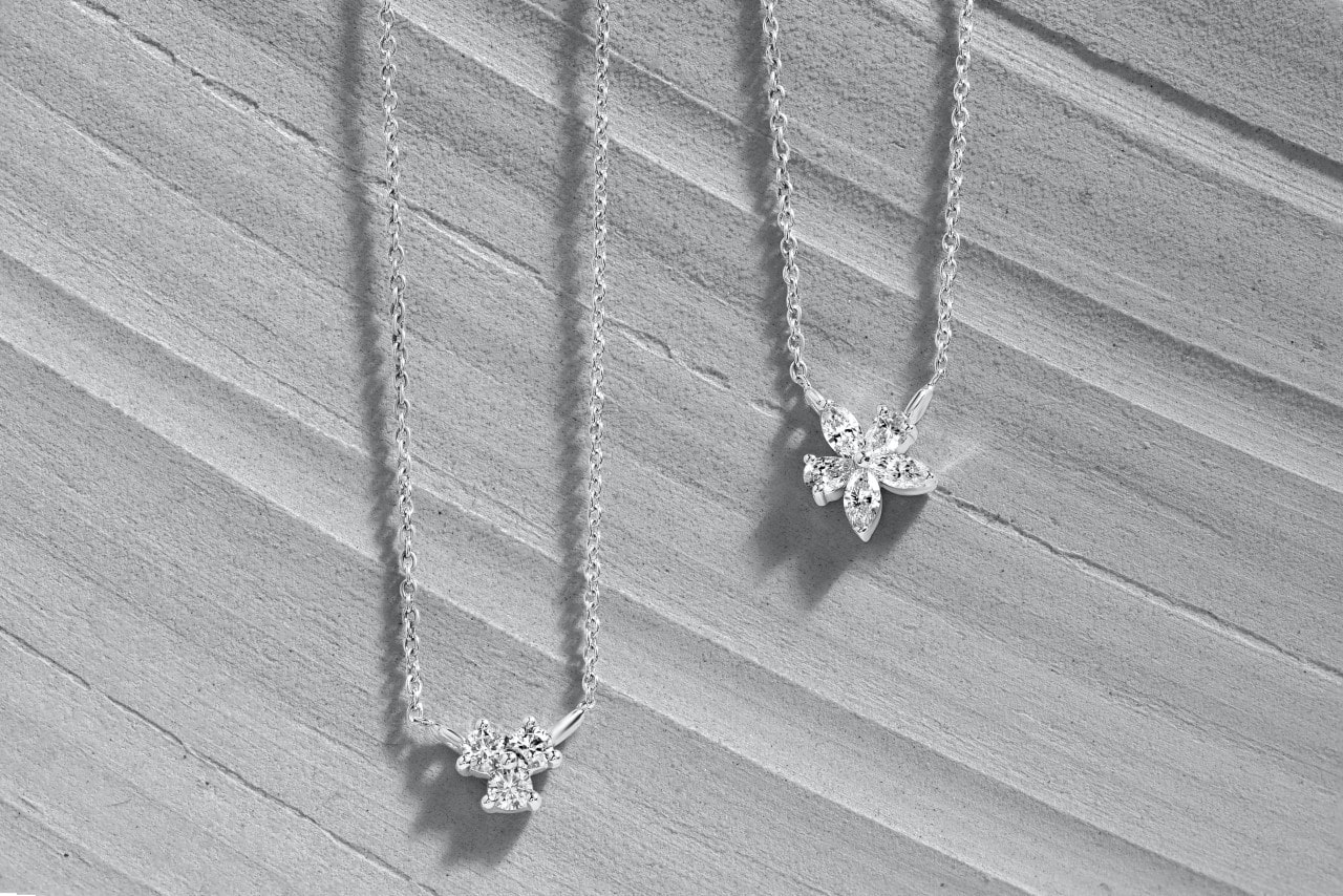 diamond necklaces on cement background